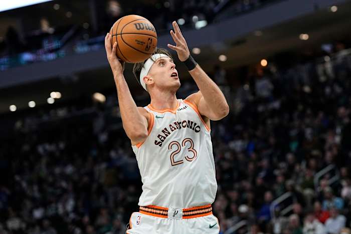 Dec 19, 2023; Milwaukee, Wisconsin, USA; San Antonio Spurs center Zach Collins (23) shoots during the third quarter against the Milwaukee Bucks at Fiserv Forum.